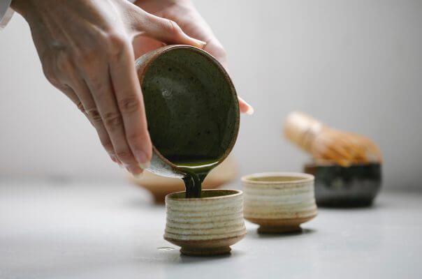 Pouring matcha tea